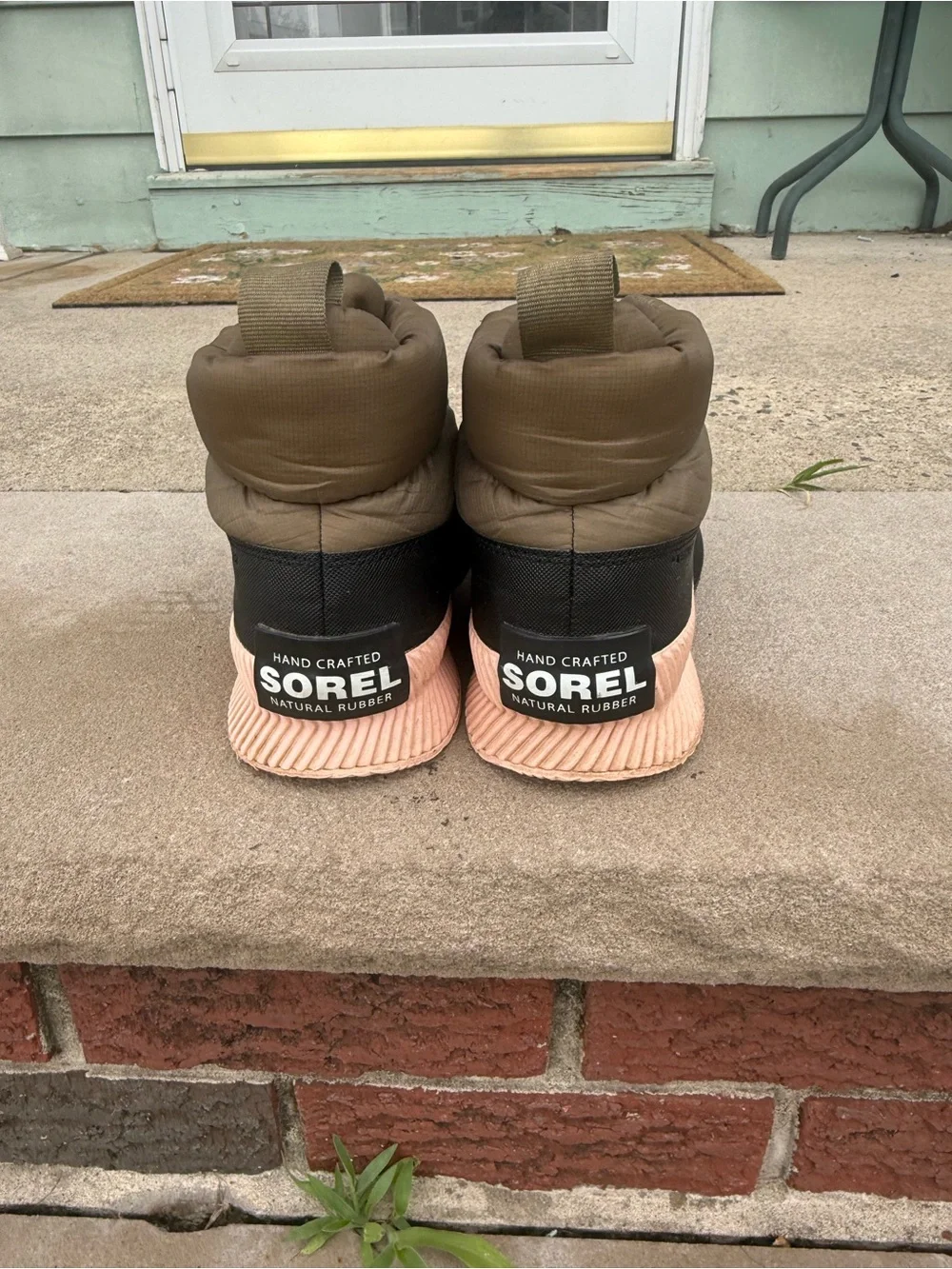 Sorel Olive Green and Black Quilted Slip-On Winter Sneakers with Pink Accent